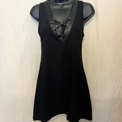 Black minidress with faux leather back details